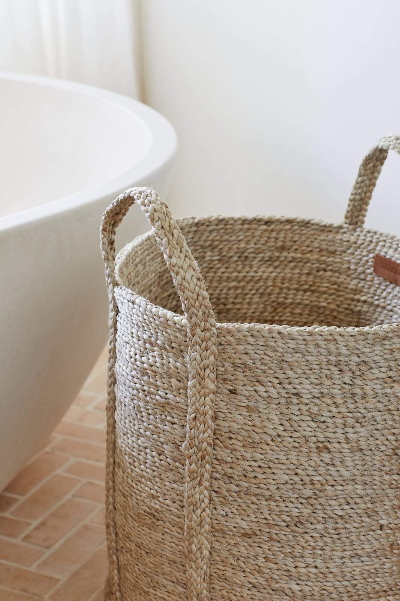 Natural Jute Laundry Basket in bathroom 