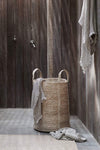 Natural Jute Laundry Basket in bathroom with towel