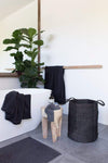 The Dharma Door Baskets and Storage jute handwoven handmade fairtrade Laundry Basket - Charcoal  in bathroom interior
